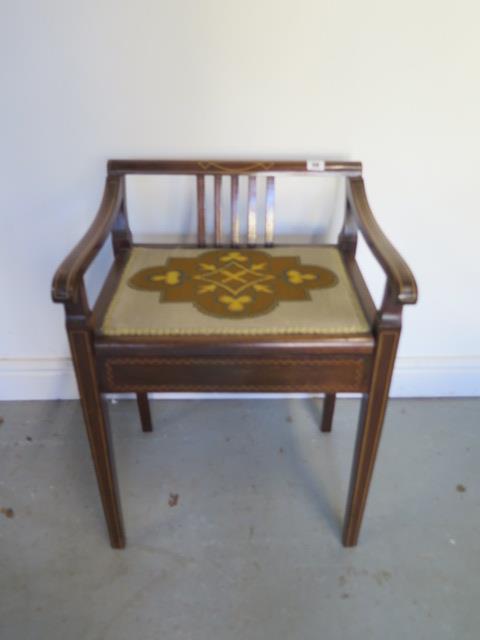 A nice Edwardian inlaid mahogany piano stool with lift up seat, 66cm tall x 48cm wide