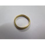 A hallmarked 22ct gold band ring, size J/K, approx 2.4 grams