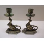 A pair of brass chamber candle sticks, 16cm tall, generally good, minor bending
