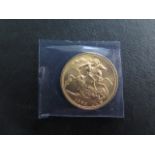 A Queen Elizabeth II uncirculated gold sovereign, dated 1963