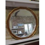 A walnut and gilt wall mirror, 69cm x 69cm