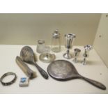 Three hallmarked silver goblets, 13cm, a worn dressing set, two worn matchstrikers, a caster and a