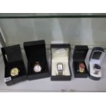 A Klaus-Kobec bracelet quartz wristwatch and four other watches, all boxed, some wear to Kobec