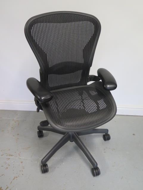 A Herman Miller Aeron office chair with lumbar support in black in good condition