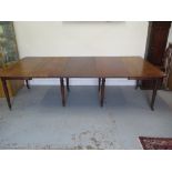 A good Georgian Cuban Mahogany pull out dining table with 3 leaves on ring turned legs 73 cm tall ,
