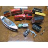 A collection of vintage pressed steel Hornby clockwork 00 gauge engines and carriages, playworn
