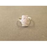 An 18ct white gold Art Deco style diamond ring, size O, diamonds are approx 0.25, marked 18K 750, in