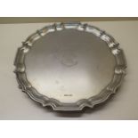 A silver crested salver Sheffield 1924/24 FBS Ltd, 3cm tall x 31cm wide, approx 32 troy oz, some