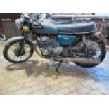 A Honda 175cc 1973 vintage motorcycle, reg PKL 22M, in need of restoration with vehicle registration