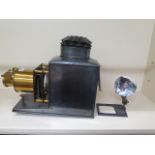 A London made JW Magic Lantern projector, 44cm long