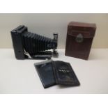 A Heinrich & Poulsen Maximar 207 folding bellows plate camera with case and plates