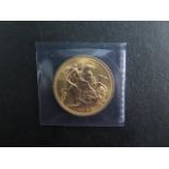 A Queen Elizabeth II uncirculated gold sovereign, dated 1962