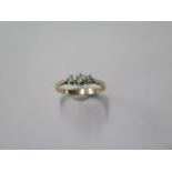 A hallmarked 9ct yellow gold diamond trilogy ring, approx 0.25ct, size P, approx 1.9 grams, diamonds