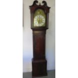 An 18th / 19th century oak and mahogany 8 day striking longcase clock with a 12" brass dial standing