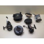 Seven fishing reels: ELO Bakelite (chipped); Eton Sun; KP Morritts Intrepid Elite; KP Morritts New