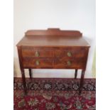 A 19th century mahogany side table with two short drawers over a single long drawer on turned reeded