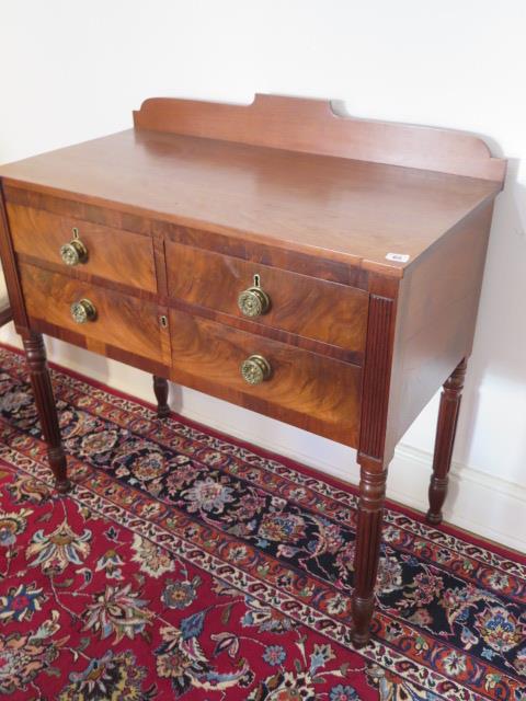 A 19th century mahogany side table with two short drawers over a single long drawer on turned reeded - Image 2 of 3