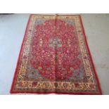 A hand knotted woollen Sarough rug, 2.05m x 1.40m