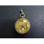 An 18ct yellow gold key wind pocket watch, 4cm case, not working and glass missing, total weight