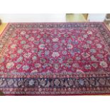 A hand knotted woollen Meshed rug, 3.52m x 2.53m