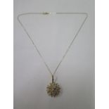 A 15ct yellow gold Edwardian pearl and diamond pendant brooch on a 18ct gold chain, pendant approx