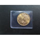 A Queen Elizabeth II uncirculated gold sovereign, dated 1959