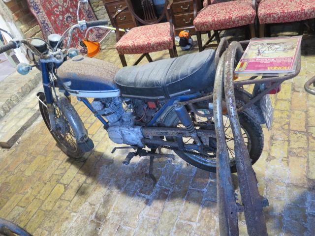 A Honda 125cc vintage motorcycle reg XOD 59K in need of restoration, no documentation or key, with a