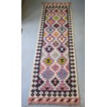 A hand knotted woollen Chobi Kilim runner, 207cm x 65cm