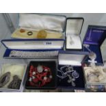 A silver bracelet and other assorted jewellery