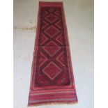 A hand knotted woollen Meshwani runner, 238cm x 64cm