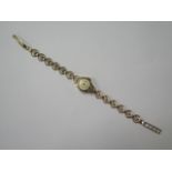 A ladies 9ct gold manual watch on a pierced link hallmarked bracelet, approx 11.9 grams, running,