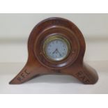 A propeller boss mantle clock carved 'April 1918 R.F.C R.A.F' with a Smiths movement, working,