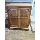 A small Oak cabinet 83 cm tall 63 by 38 cm