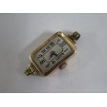 A 9ct manual wind ladies watch head, 13mm case, running and hands advance