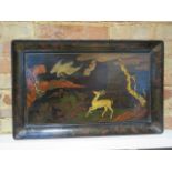 An 18th century lacquer and paper-mache tray table top ,decorated with a deer and crane design