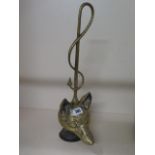 A brass and iron fox head and crop door stop, 46cm tall