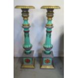 A pair of rare and unusual cast iron decorative pricket candle stands, 103cm tall