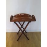 A 19th century mahogany folding Butlers tray on stand, 72cm x 48cm wide closed