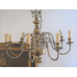 A brass eight branch hanging chandelier light, 63cm tall x 75cm wide