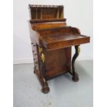 A good quality 19th century burr walnut piano top Davenport, the pop up galleried top section