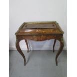 A good 19th century burr walnut marquetry inlaid ormulu mounted free standing table jardinere with a