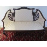 An Edwardian reupholstered mahogany settee, 91cm tall x 123cm wide