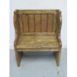 A rustic pine hall bench, 92cm tall x 73cm x 40cm