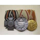 A German trio of medals including an Austro-Hungarian medal