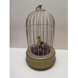 A 20th Century singing bird in a cage automaton, 26cm tall, in working order