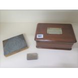 A mahogany desk cigarette box presented to HMS Kelantan from Harland and Wolff Ltd, dated 1944 and