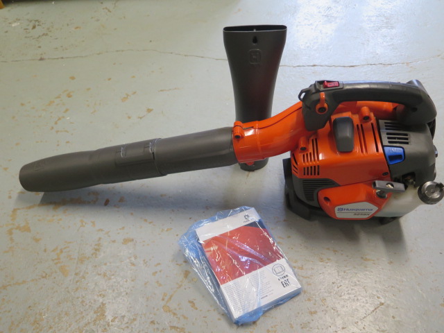 A Husquvarna petrol leaf blower 525BX, with extra nozel and handbook, in good working order