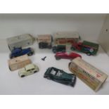 Six tinplate Minic clockwork vehicles and a plastic Minic Morris Saloon, five with part boxes,