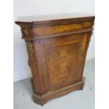 A good quality 19th century marquetry inlaid walnut cabinet with ormulu mounts the single