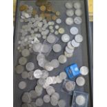 A collection of assorted coinage including 7 silver crowns